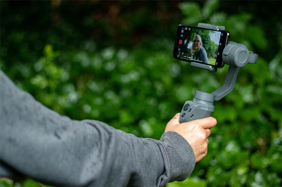 iPhone 11 Pro being used to film for a small business promotion