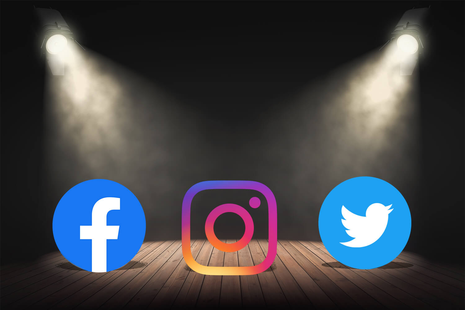 Social media icons on stage lit by two spotlights